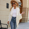 Vue rapprochée poncho cardigan cachemire tricot épais côtelé ouvert devant