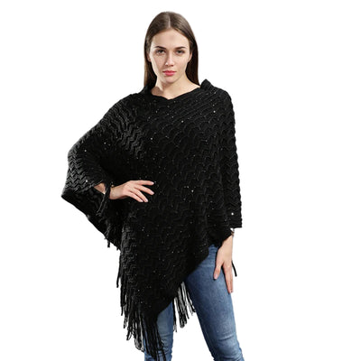 Poncho asymétrique tricot paillettes longues franges coupe moderne élégante