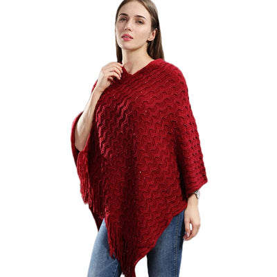 Poncho tricot asymétrique paillettes détails longues franges look sophistiqué